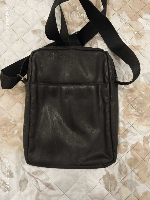 Mala tiracolo Samsonite em muito bom estado.