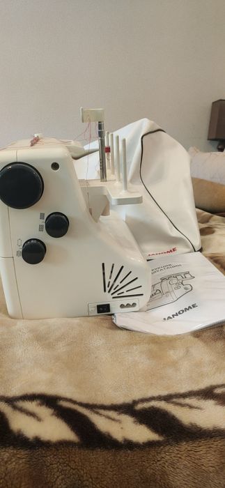Распошивальная швейная машинка Janome CoverPro 2