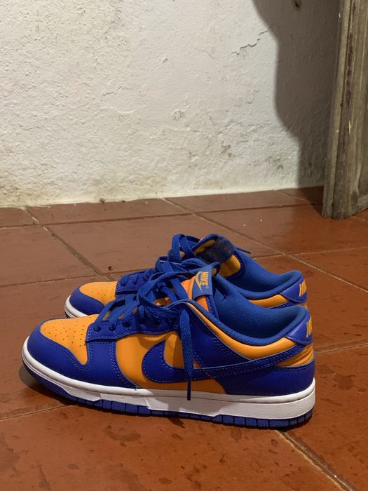 Venda de sapato nike azul e laranja