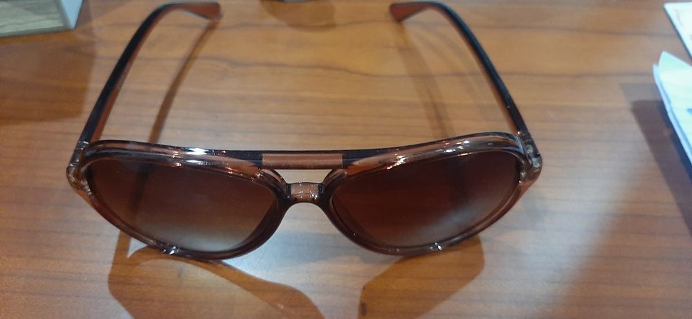 Oculos de sol castanhos64751416911233122