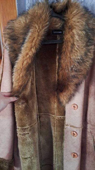 Casaco castanho pelo
