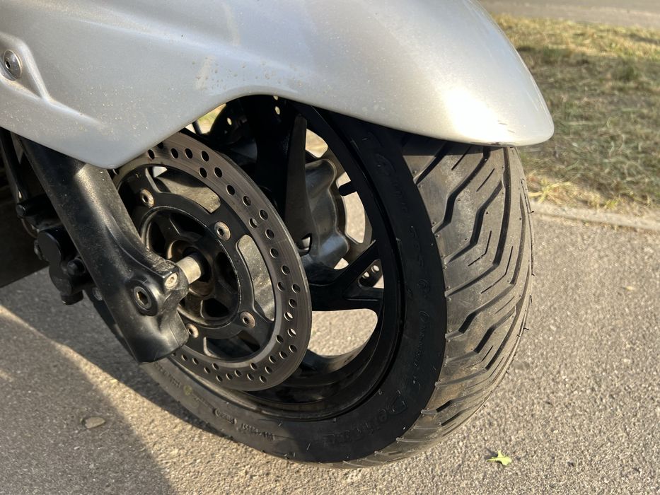 Suzuki SkyWave 400 (Скайвей, Бургман)