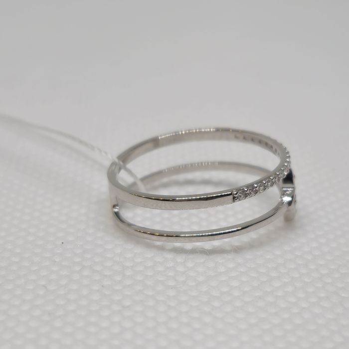 Каблучка з білого золота. Нова. Sovissimo.