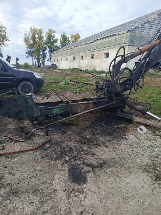 Екскаватор погрущик