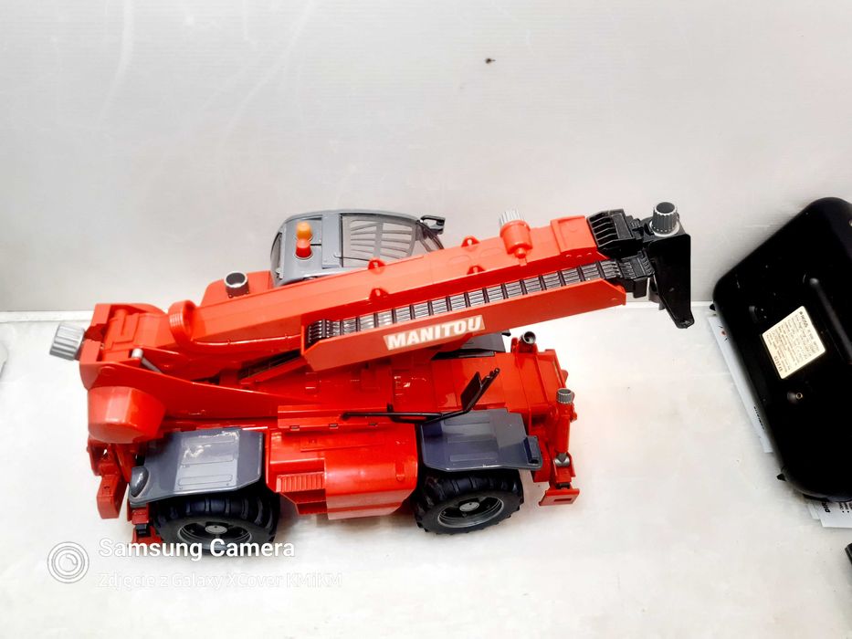zabawka dźwig ładowarka model Bruder Manitou MRT2150 uszkodzona