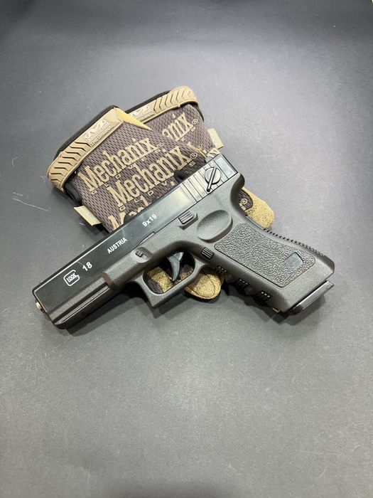 Іграшковий пістолет Glock 17 з маркуванням +500 куль, 6 мм, пружинний