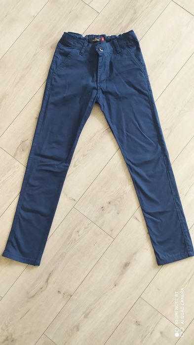 Штани   сині   .