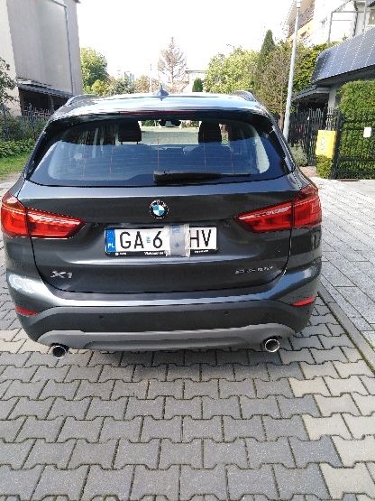 BMW X1. Bezwypadkowy. Hak holowniczy chowany. Garażowany.