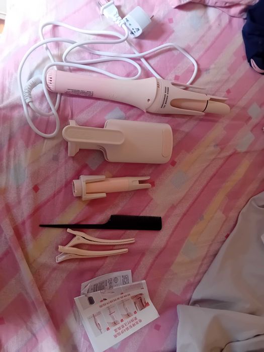 Modelador de cabelo automático