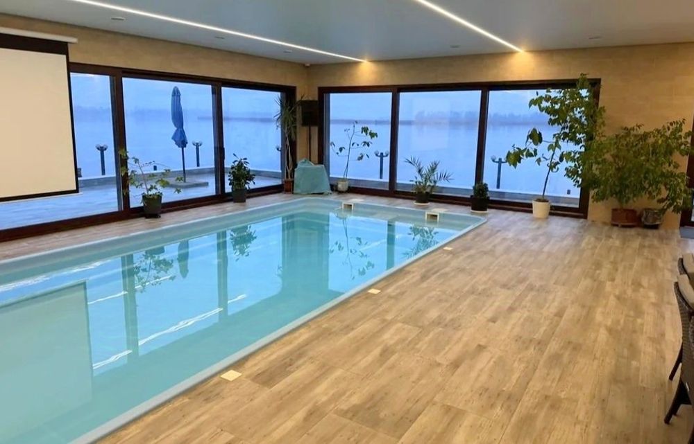 #638 Будинок подобово біля річки з теплим басейном