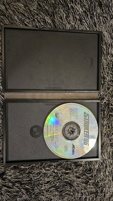 Sega Saturn com caixa