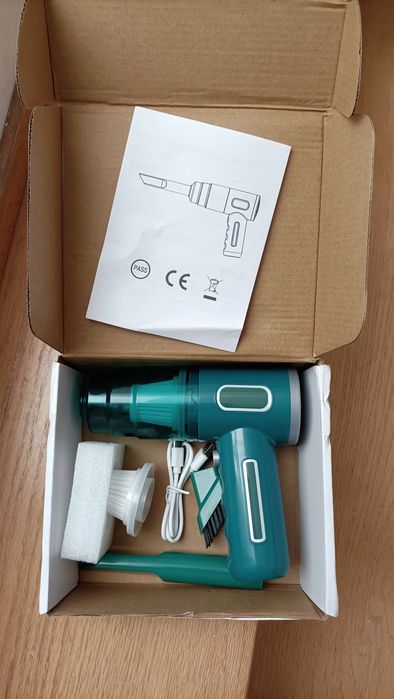 Mini aspirador portátil