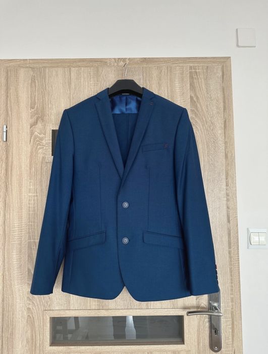 Garnitur męski młodzieżowy elegancki  granatowy  Wiliński