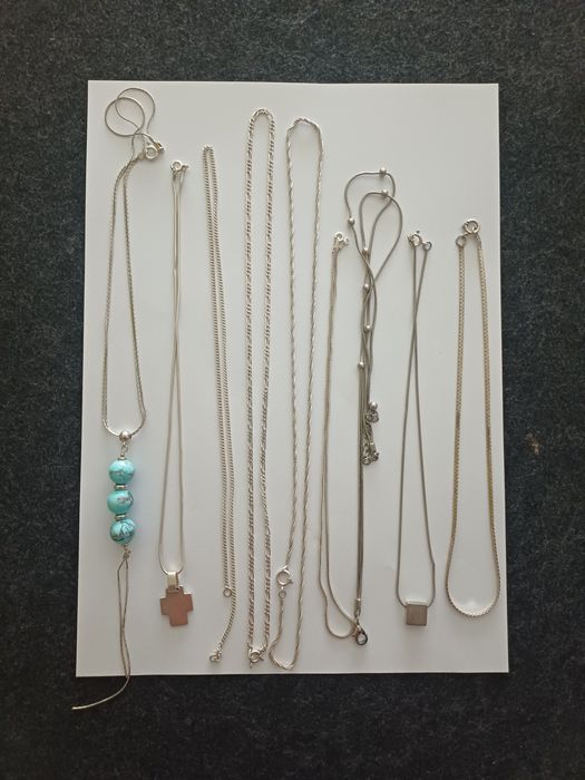 105 gramas de artigos em prata