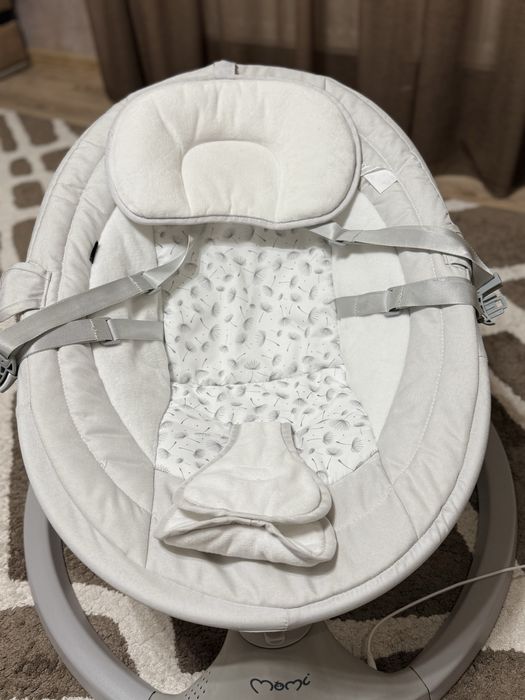 Заколисуючий центр гойдалка