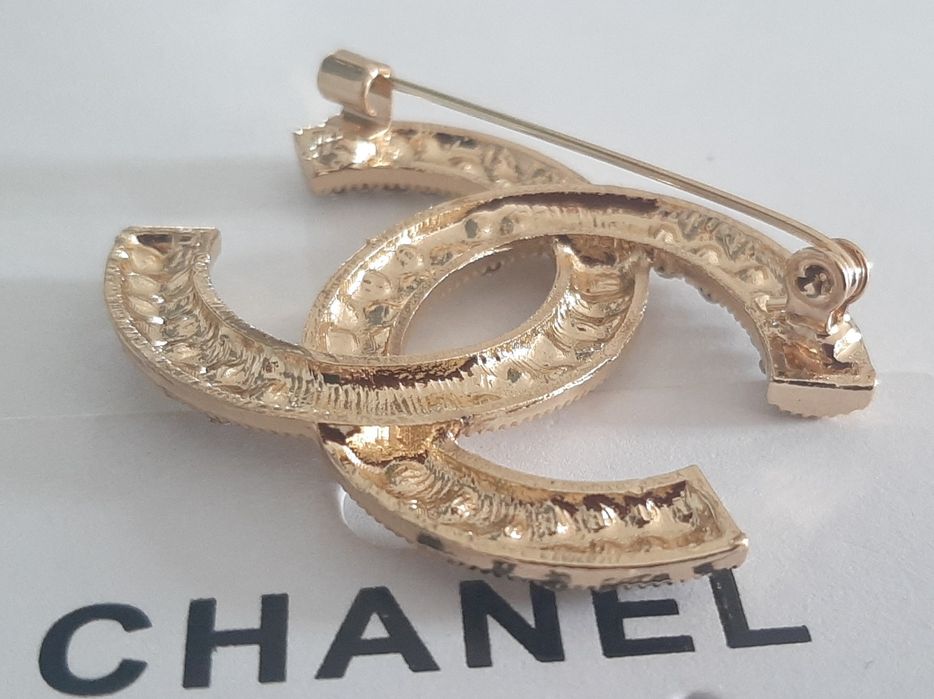 Przepiękna, złota broszka kryształki