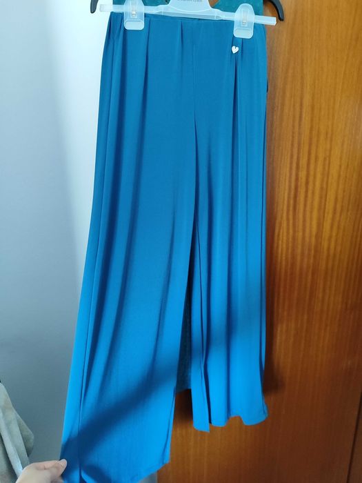 Calças pantalona fluídas azul céu marca: Pinto & Castro S/M