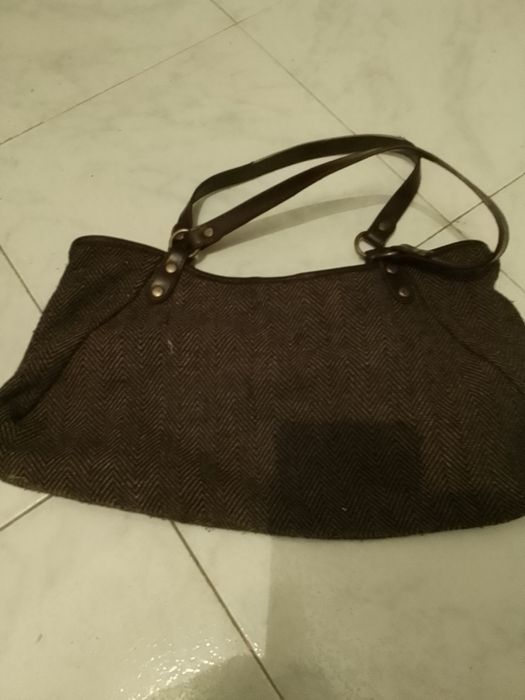 Malas de mulher como novas