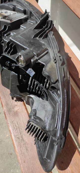 Lewa lampa Ford Fusion HS73-13E015-AF uszkodzona