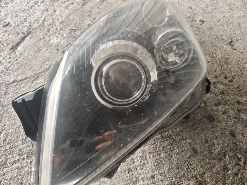 Reflektor Xenon lewa opel astra h
