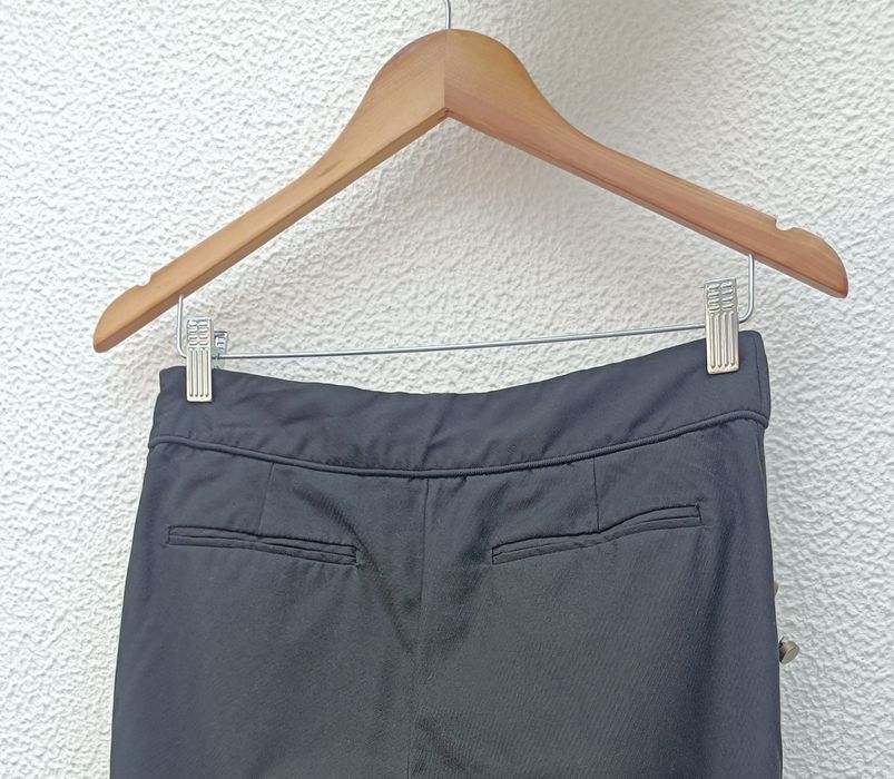 Calças pretas com botões dourados Zara