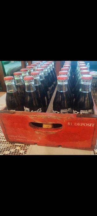 28 butelek coca cola dla kolekcjonera ze skrzynka