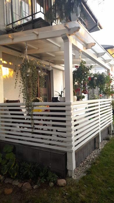 Taras drewniany zabudowa tarasu deska tarasowa modrzew