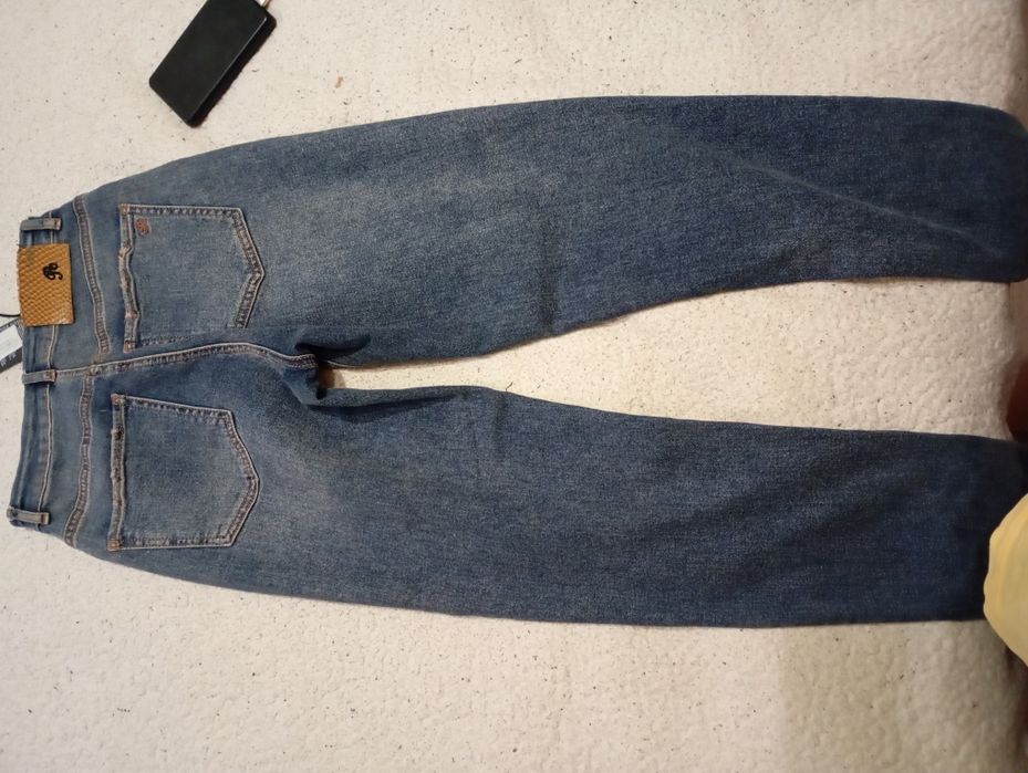 Новые женские джинсы