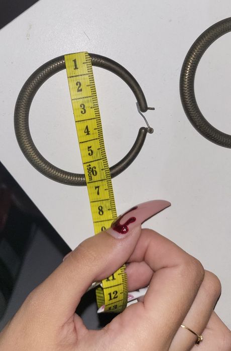 Argolas género cobre escuro