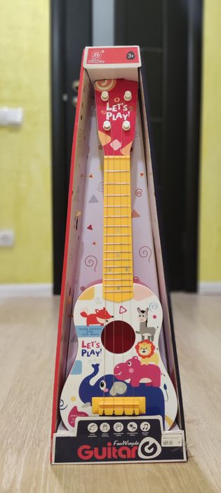 Продам детскую гитару