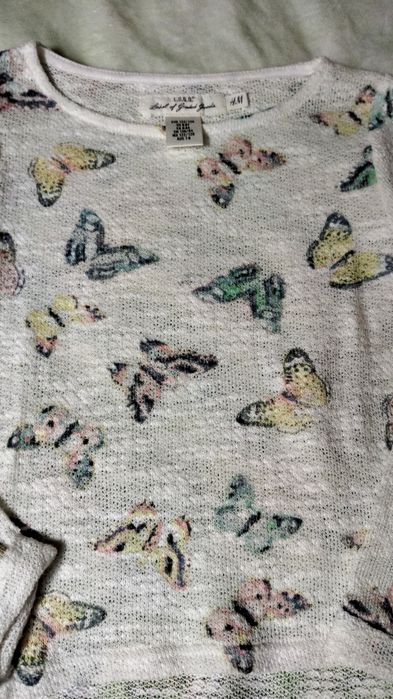 Sweterek w motyle H M rozmiar 122/128