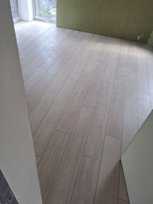 Укладка линолеума,  ковролина , заливка нивелир масса