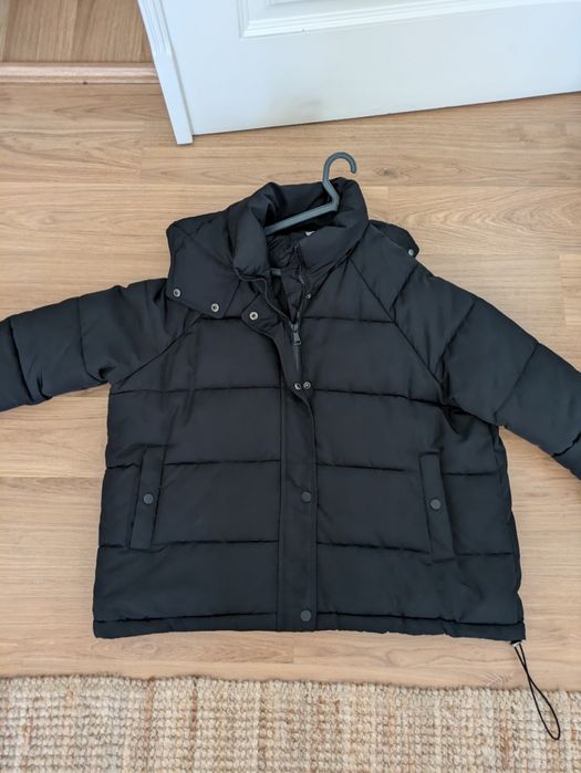 Casaco de penas preto