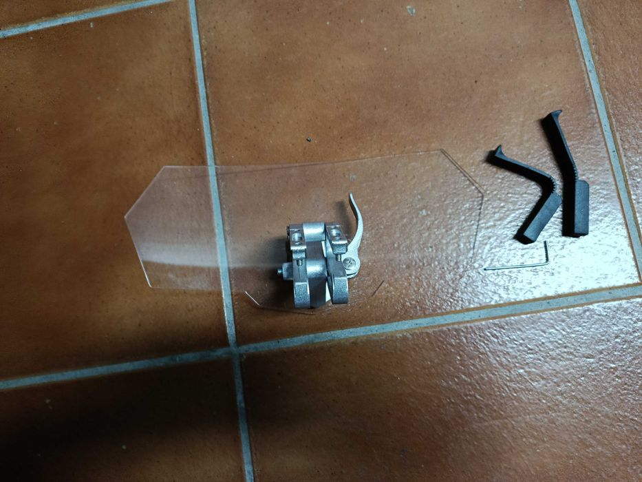 Defletor de ar parabrisas