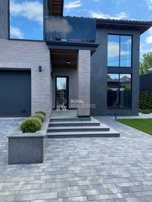 Продаж Будинок Київ Голосіївський район вул. Малокитаївська 300 м² 4 спальні Ділянка 5 соток Газ Гараж Підвал 20 кВт Під чистове оздоблення