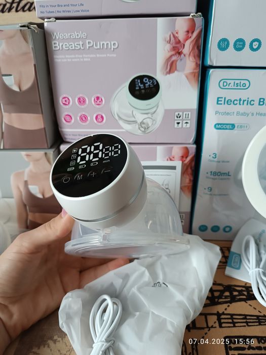 Молоковідсмоктувач електричний електромолоковідсмоктувач