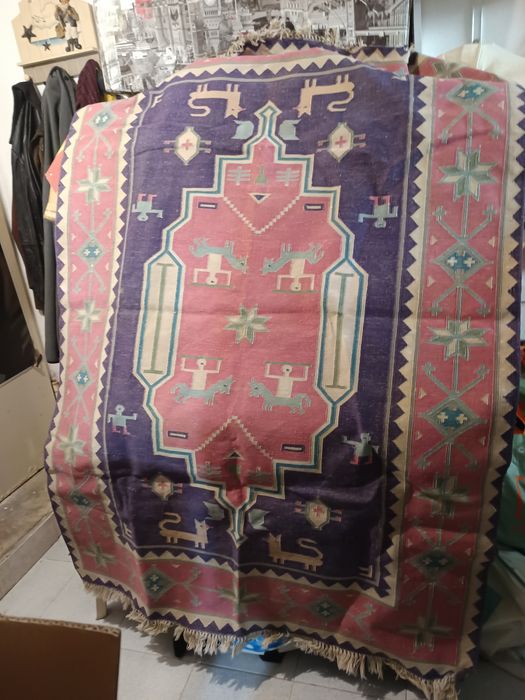 Vendo um tapete de bom estado para a sala