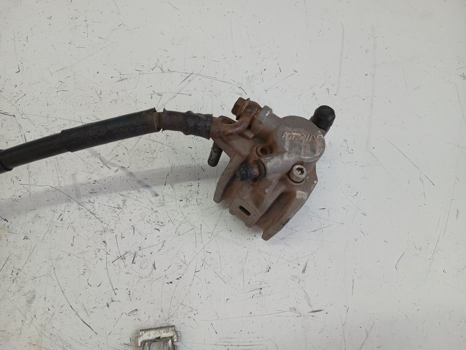 Zacisk hamulcowy tył tylny pompa hamulcowa tył Suzuki RM 125 / 250 95r
