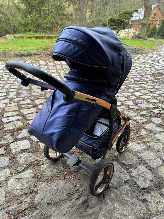 Wózek dziecięcy Junama dla dwójki dzieci w kolorze niebieskim