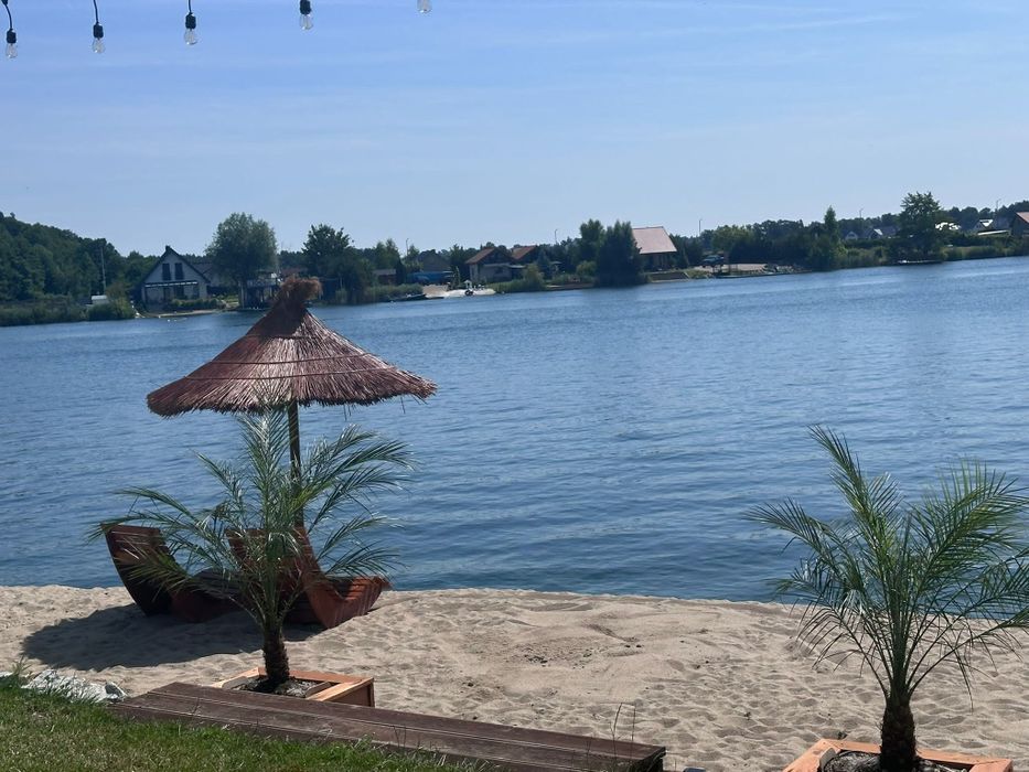 Domek nad jeziorem z własną plażą , sauna, jacuzzi