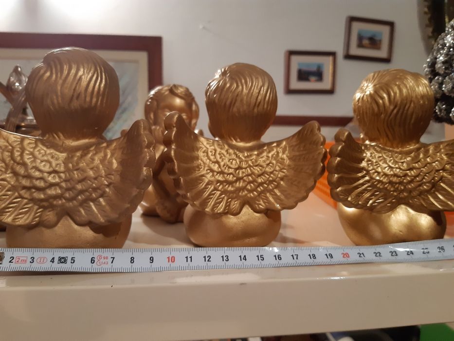 Anjos em loiça dourados