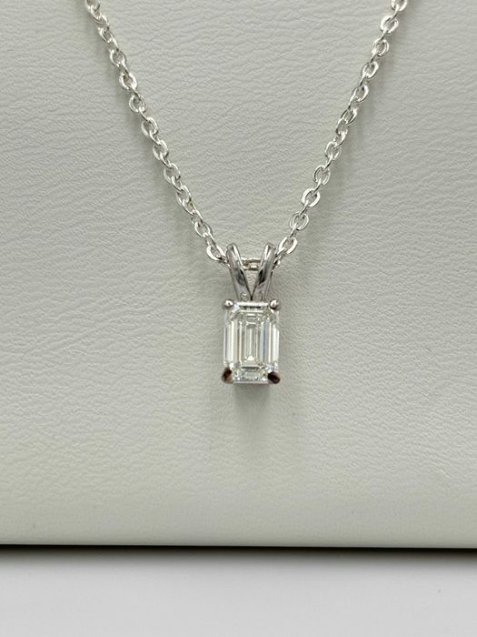 Zawieszka 0,71ct H/VS2 z naturalnym diamentem, brylantem. Certyfikat IGI, celebrytka.
