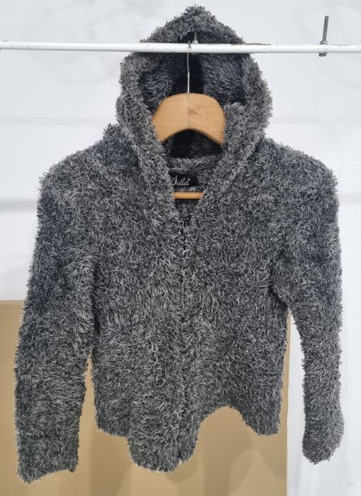 Casaco de Mulher não é novo em bom estado