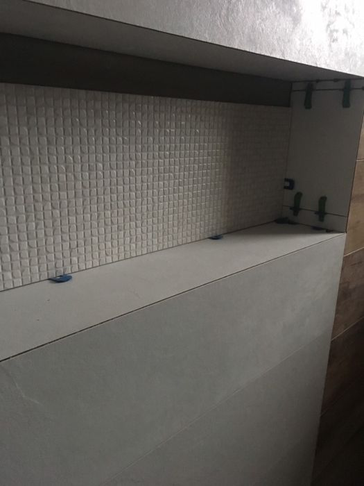 Укладка плитки, штукатурка, сантехника