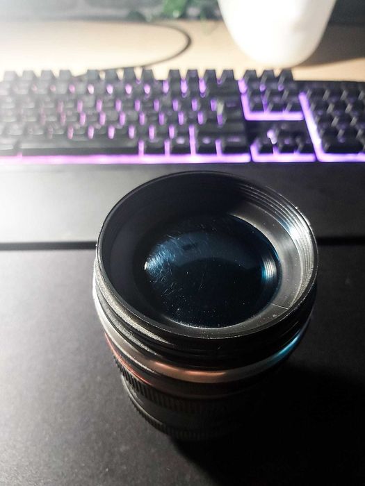 Copo lente fotográfica