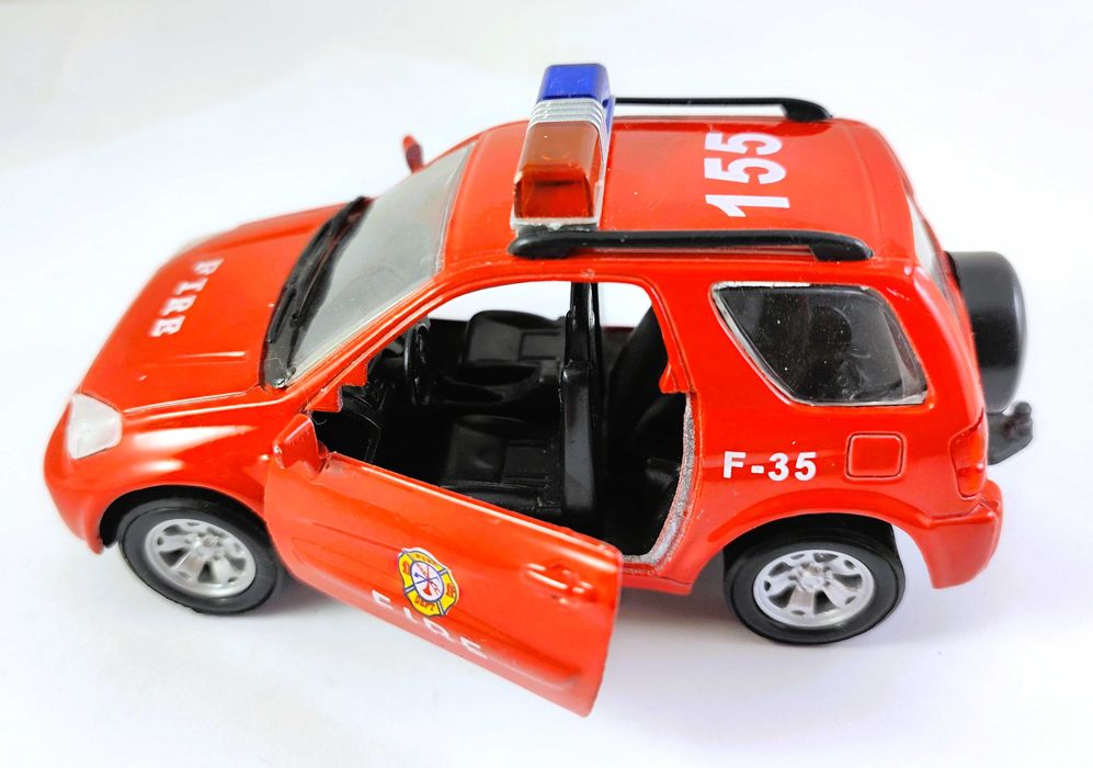 Коллекционная игрушечная машинка Toyota RAV4 в ливрее пожарной службы.