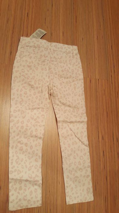 Nowe spodnie rozm.122