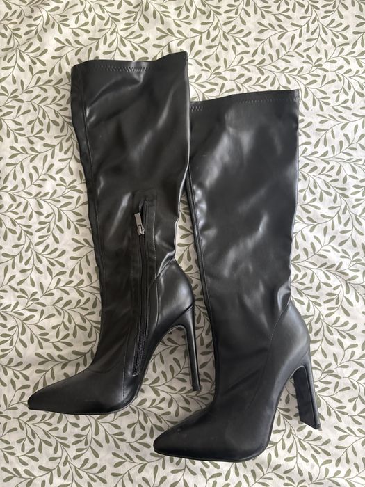 Botas pretas altas