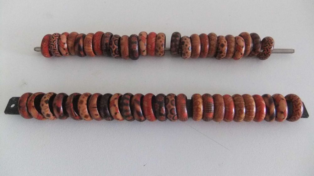 50 argolas (20mm, diâmetro)  em madeira decorada.