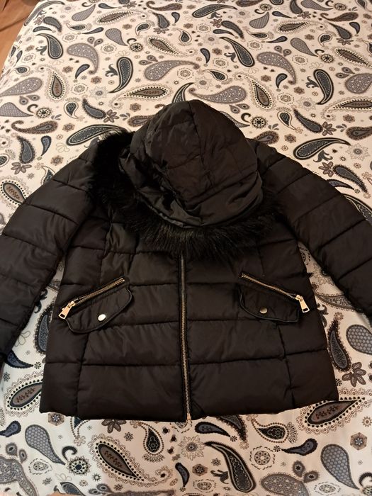 Quispo preto com carapuço